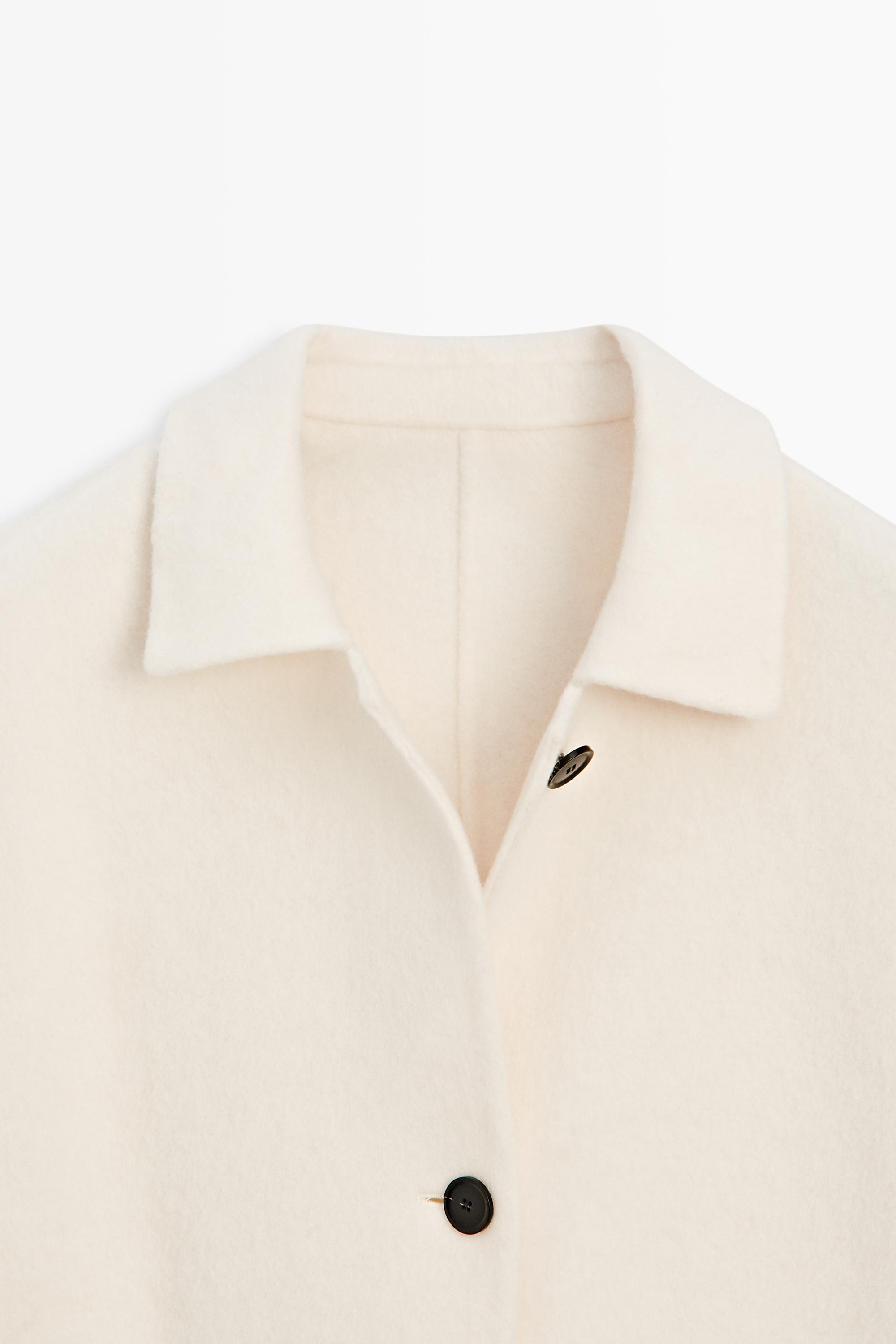 Manteau mi-long boutonné en laine mélangée